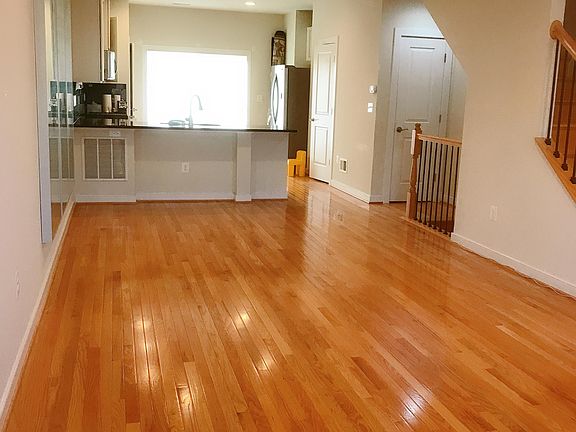 Hardwood floor for family room, living area, and the kitchen.