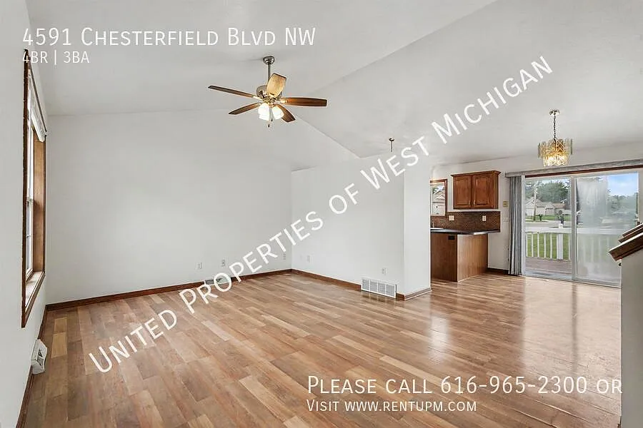 Available Now | 4 Bed 3 Bath Single Family Home in Walker | 2 Stall Garage | Back Patio | Lower L... — Photo 4