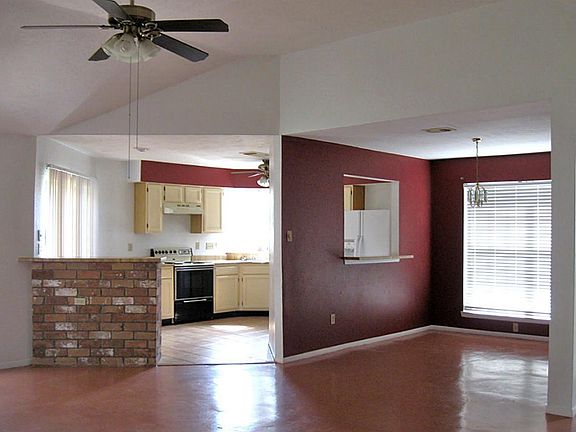 kitchen with pass-thru to dining room.