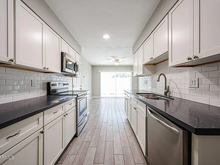 5634 S Captain Kidd Ct #D — Photo 10