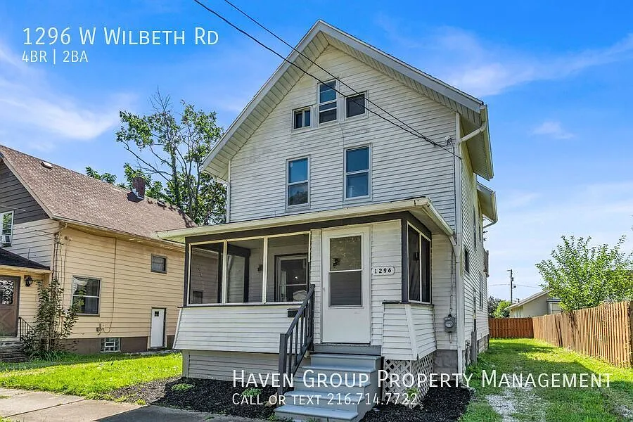 1296 W Wilbeth Rd, Akron, OH 44314- Spacious 4-bed 2-bath single-family home! — Photo 2
