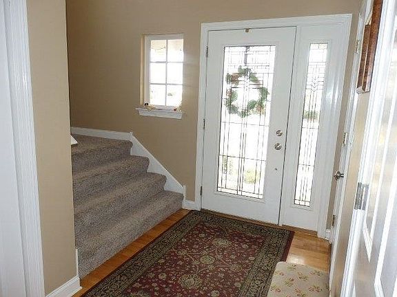Beautiful entry to the home, with extra wide staircase/landings to the upper level.
