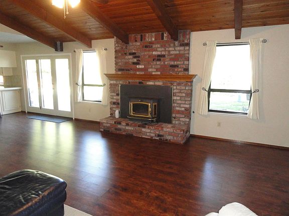Back towards the kitchen from the corner of this specious room!