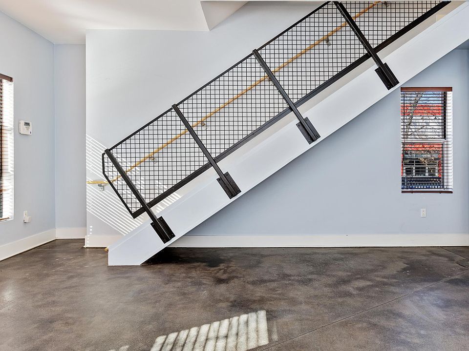 First level photo 4 and these are the stairs up to the main level