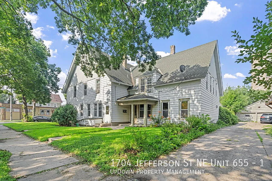 "Charming 2-Bed Gem in Northeast Arts District Neighborhood with Laundry in Unit!" — Photo 2
