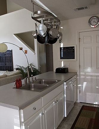Another view of kitchen overlooking living room