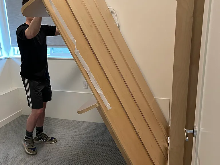 Lowering the Murphy bed platform