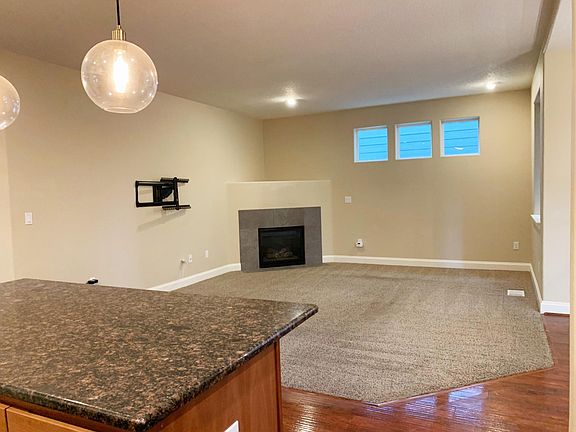 Open concept living room with gas fireplace