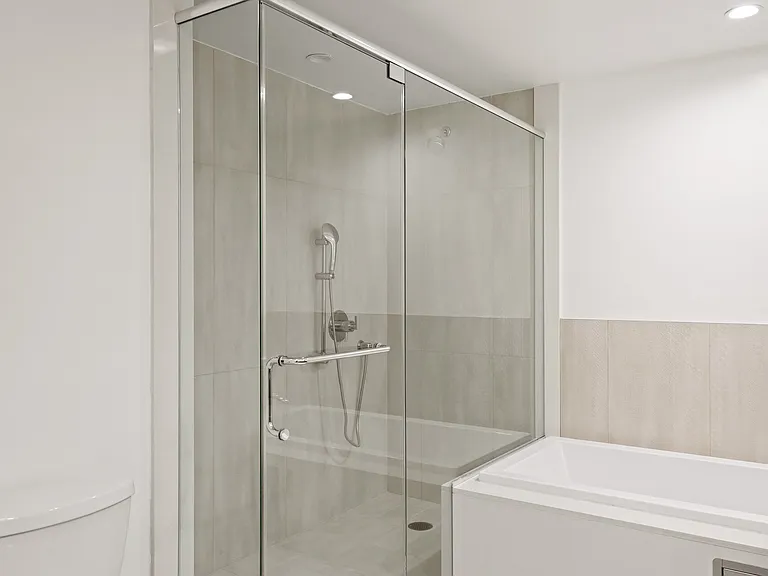 Master Bathroom with Walk-In Shower and Full-Size Bathtub