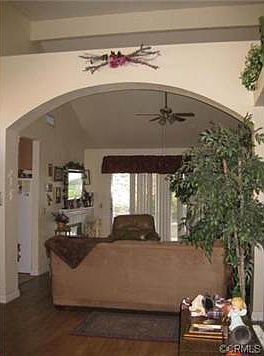 great room with arch way