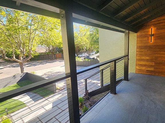 Front porch with front yard and street/neighborhood view