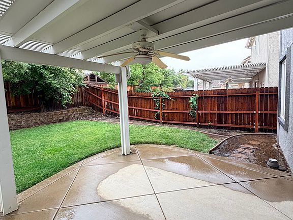 backyard with patio,ceiling fan
