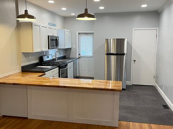 Open concept, front room to kitchen.