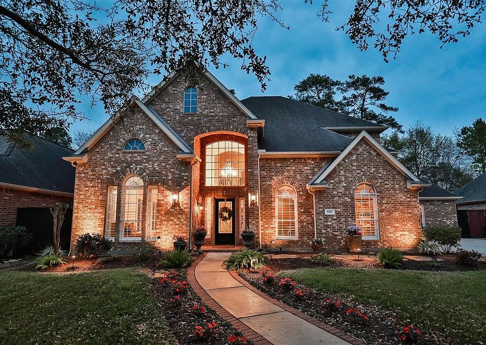 Welcome to 5514 Darschelle Drive in the beautiful, tree-lined neighborhood of Champion Forest.