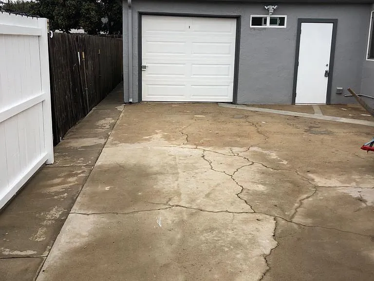 One car garage with EV charging and full use of the long driveway