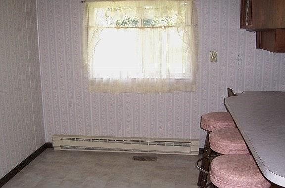 EAt in kitchen with 4 barstools