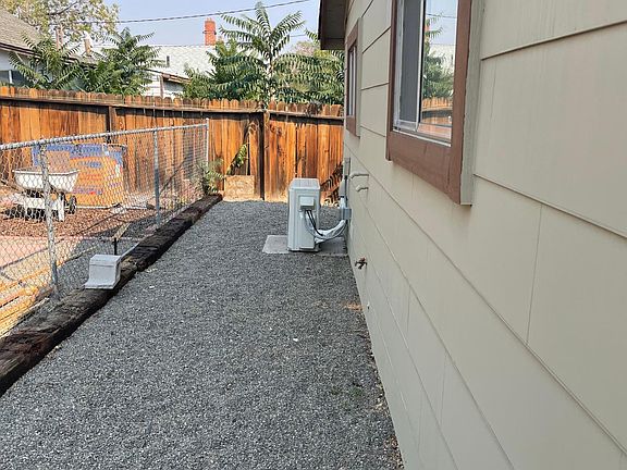 has gated side and small back yard