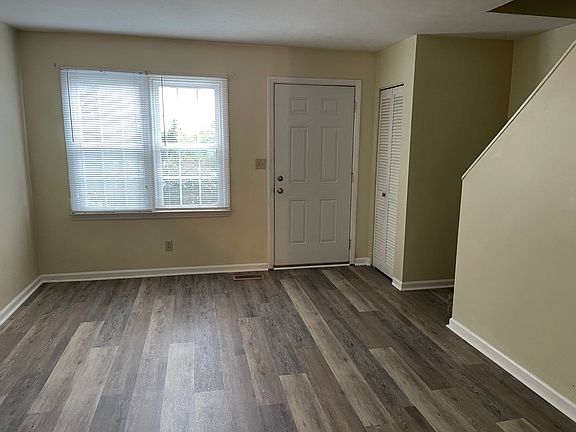 Front door/living room, coat closet