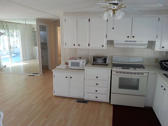 2nd image of 166 NE Pinelake Village Blvd