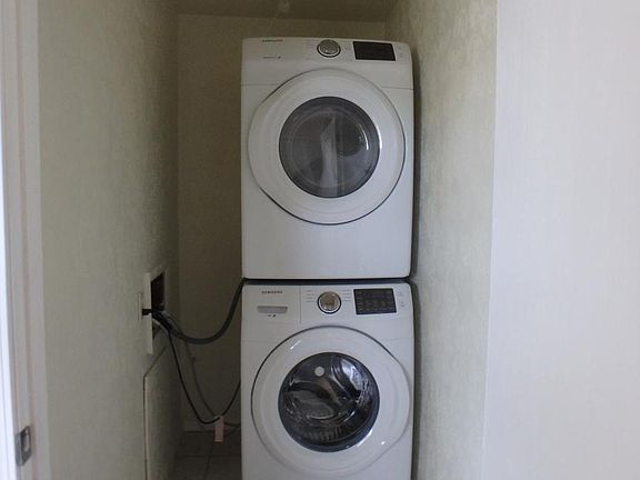 Laundry closet with brand new washer/dryer
