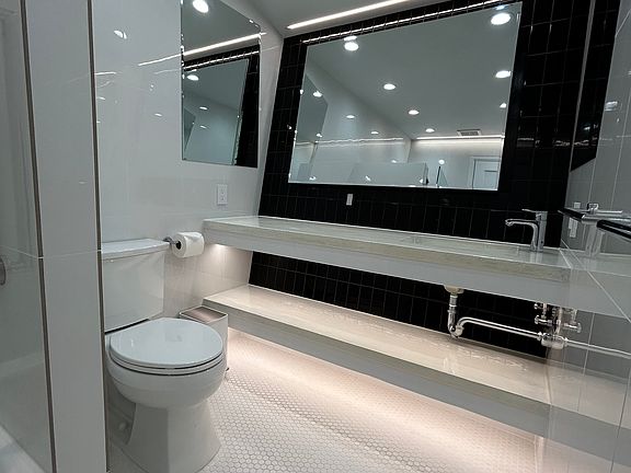 Common bathroom sink and toilet