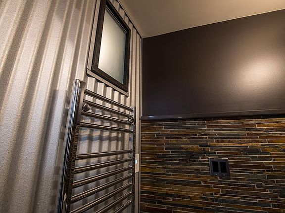 Modern Features like Towel Warmers and smart lighting