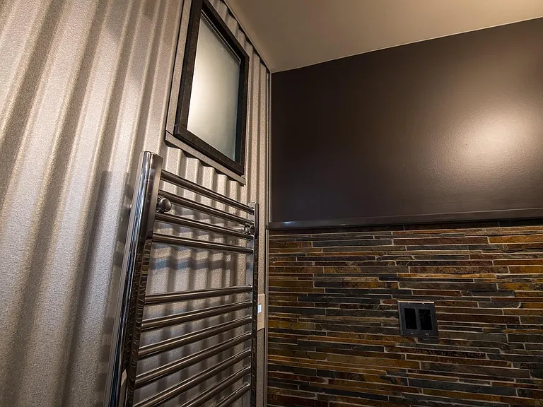 Modern Features like Towel Warmers and smart lighting