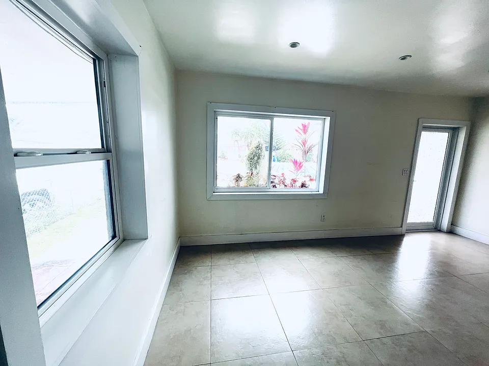 living room view to front entrance door