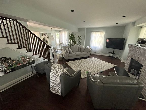 Living room photos added for staging purposes show open floor plan and reflect prior tenancy.