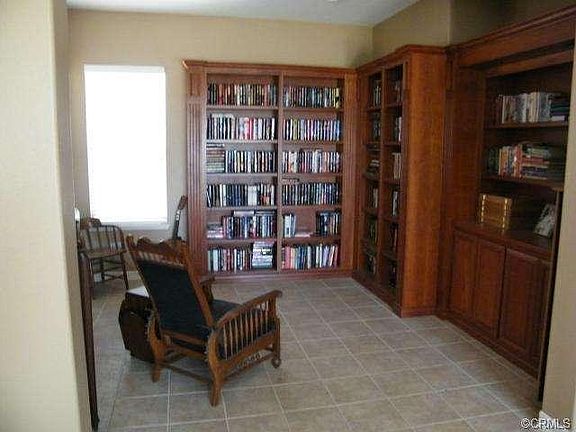 Office with beautiful built in cherry cabinetry