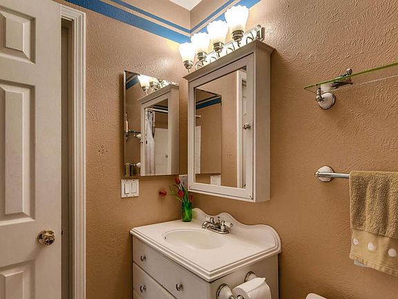 Bright bathroom with an octopus