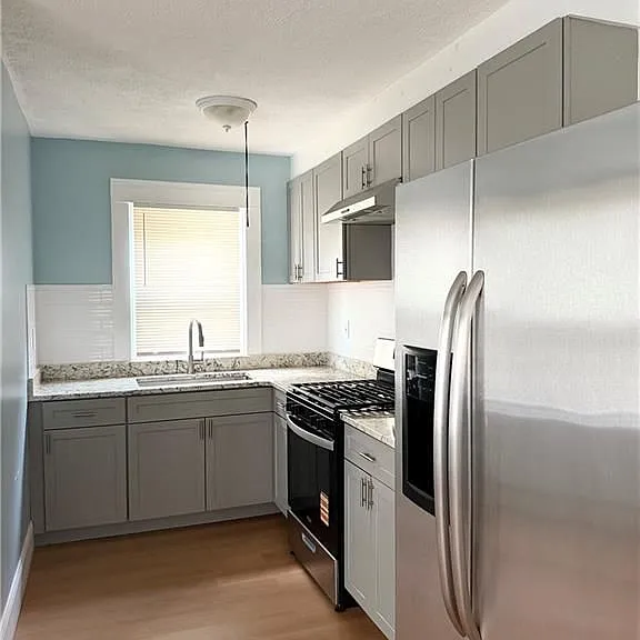 694 Killingly St — Photo 1