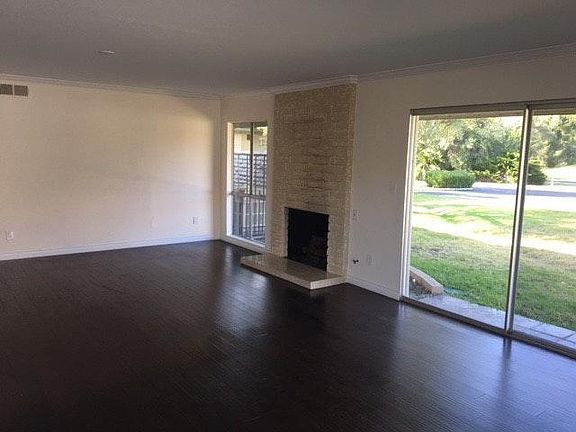 Spacious Open Living Room with Gas Fire Place
