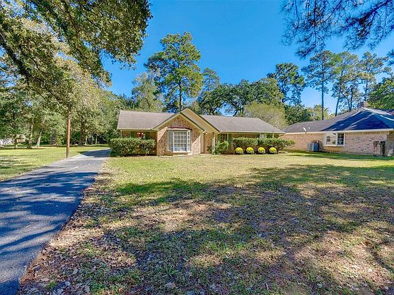 Your long driveway will provide extra parking during family events. The garage is detached and sits behind the house.