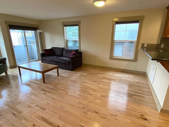 Open living, dining, kitchen space.