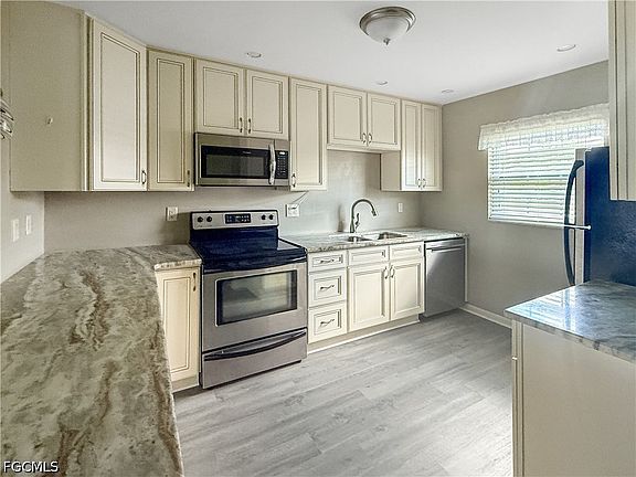 5th image of 1398 Myerlee Country Club Blvd