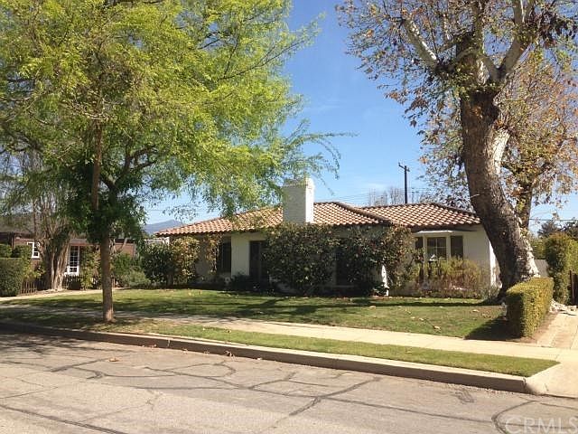 FRONT OF HOME LOCATED ON AN OVER SIZED LOT WHICH IS A LOT AND 1/2