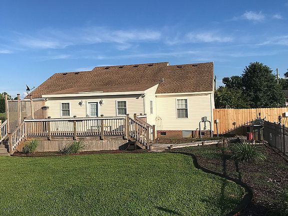 Deck w/ walkway to pool