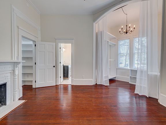 Primary bedroom with closet and ensuite bathroom.