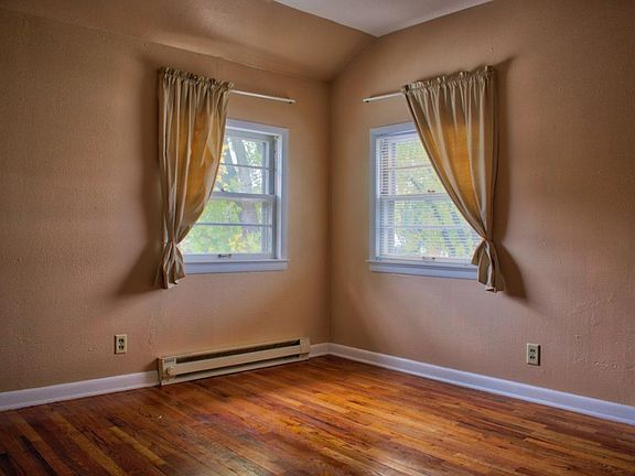 Both bedrooms have hardwood floors.