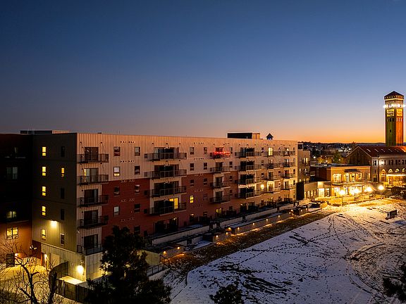 Experience the elegance of city living in this beautifully lit apartment complex.