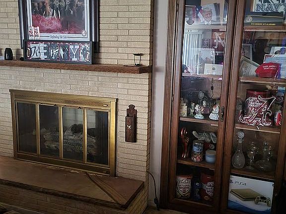 FIreplace and display case.