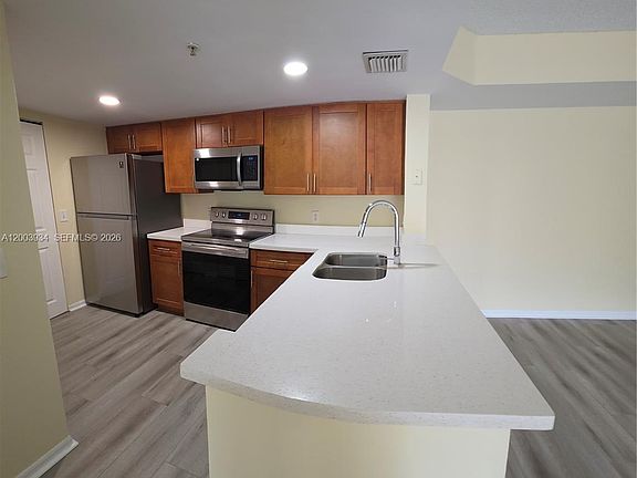 2nd image of 5051 Wiles Rd APT 201