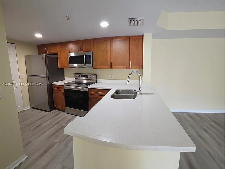 5051 Wiles Rd #201 — Photo 2