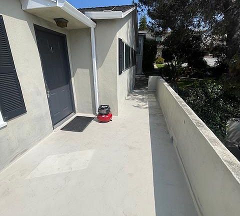 Large private front balcony. Newly coated deck