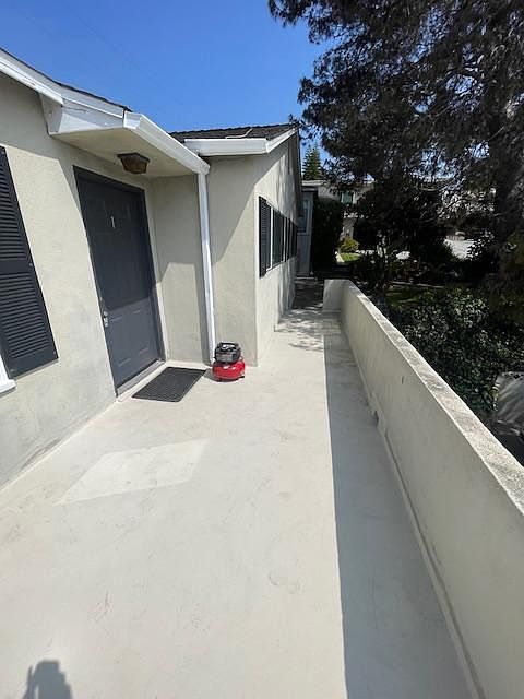 Large private front balcony. Newly coated deck