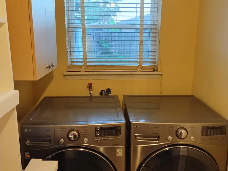Washer and Dryer in Utility/Pantry.