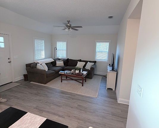 LIVING ROOM RENDERING (taken from another home with same color scheme)