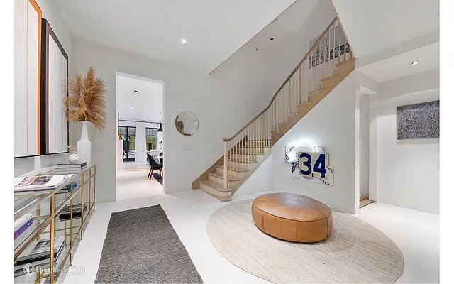 Sold by Douglas Elliman | media 11