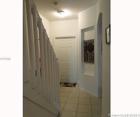 3rd image of 5713 NW 114th Ct #Townhouse 106
